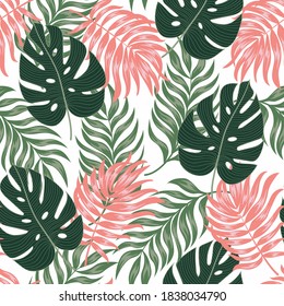 Original seamless tropical pattern with bright plants and leaves on a white background. Summer colorful hawaiian seamless pattern with tropical plants. Summer colorful hawaiian.