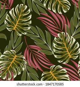 Original seamless tropical pattern with bright plants and leaves on a dark green background. Tropical botanical. Summer colorful hawaiian seamless pattern with tropical plants.