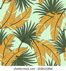 Original seamless tropical pattern with bright plants and leaves on a bright green background. Beautiful exotic plants.  Seamless pattern with colorful leaves and plants.