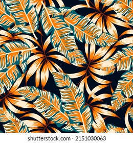 Original seamless tropical pattern with bright plants and leaves on a black background. Summer colorful hawaiian. Colorful stylish floral. Tropic leaves in bright colors. Hawaiian style.