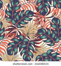 Original seamless tropical pattern with bright plants and leaves on a delicate background. Beautiful seamless vector floral pattern. Trendy summer Hawaii print.