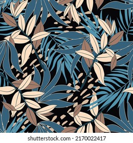 Original seamless tropical pattern with bright plants and leaves on a black background. Beautiful seamless vector flower pattern. Summer colorful Hawaiian seamless pattern with tropical plants.