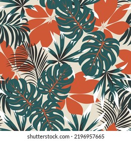 Original seamless tropical pattern with bright plants and leaves on a beige background. Exotic jungle wallpaper.Colorful stylish floral.  Summer colorful hawaiian.