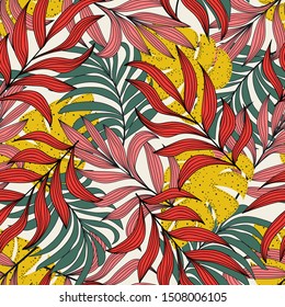 Original seamless tropical pattern with plants and leaves in yellow on a white background. Summer colorful hawaiian seamless pattern with tropical plants. Exotic wallpaper. Hawaiian style.