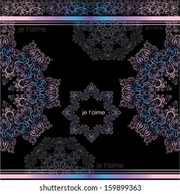 original snowflakes, patterns and inscriptions of Je t'aime! on a black background. Translation: I love you