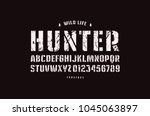 Original stencil-plate sans serif font. Bold face. Letters and numbers with rough texture for logo and emblem design. White print on black background