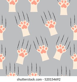 original trendy vector seamless pattern with cat paw print with claws