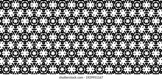 Ornament with elements of black and white color. Tribal ethnic vector texture. Geometric folklore ornament. Seamless pattern.