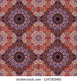 Ornament made of various red, purple and brown shapes. Random layout. Gift wrapping paper. Bed sheets and interior. Seamless abstract vector geometric pattern.