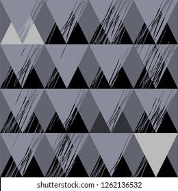 Ornament from triangles and free lines in black and grey colors seamless pattern on a grey background.