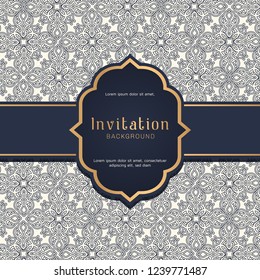 Ornamental blue pattern with wedding badge