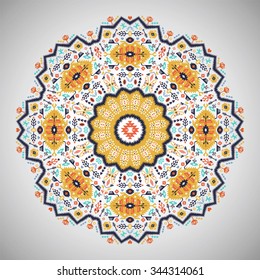 Ornamental colorful round geometric pattern in aztec style