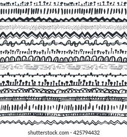 Ornamental ethnic seamless pattern. Endless hand drawn backdrop in boho style, tribal trendy ornament. Horizontal decorative black lines on white background. For cloth, wallpaper, wrapping
