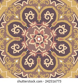 Ornamental ethnicity pattern in warm colors. The circular arrangement of stalks and leaves. Ornament of the dark brown contrasting beige and ginger elements.