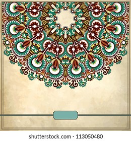 Ornamental floral circle pattern with place for your text, in grunge background