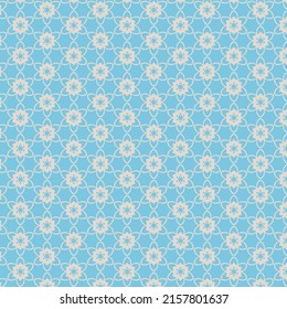 Ornamental geometric seamless pattern. Vector blue and beige abstract background.