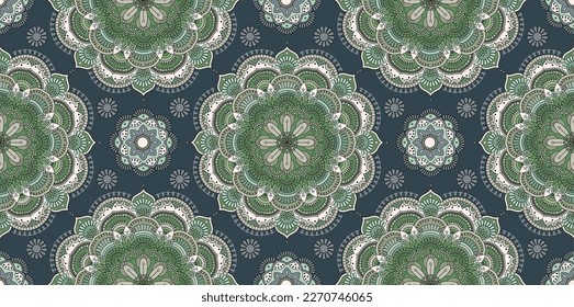 Ornamental green mandala pattern on dark blue backround. Round Ornament Seamless pattern. Indian. Arabic, Islam ornament, Buddhism culture symbol