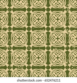 Ornamental grunge vintage textured green background. Scratched old seamless