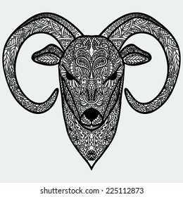 Ornamental head of goat or sheep - a symbol of new new year 2015. Black-and-white concept. Vector illustration.