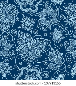 Ornamental indian pattern  with flowers on blue background.