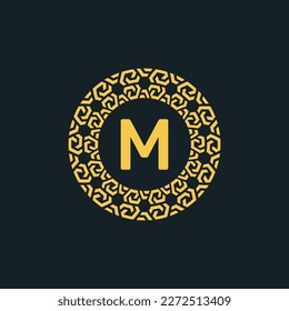 Ornamental initial letter M circle emblem frame logo