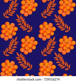 Ornamental leaves and berries of mountain ash. Seamless abstract vector illustration