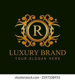 Ornamental logo featuring a gold monogram encased in an intricate decorative frame on a dark green background.