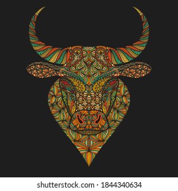 Ornamental ox head. T-shirt print, decoration for the Chinese year of ox. Portrait of a bulls face. Vector illustration