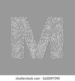 Ornamental paper letter M isolated on gray background. Laser cut template. Vector illustration