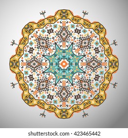Ornamental round bright geometric pattern in aztec style
