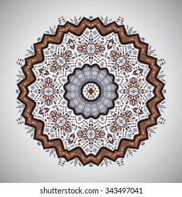 Ornamental round colorful geometric pattern in aztec style