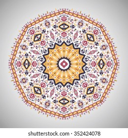 Ornamental round colorful  geometric pattern in aztec style