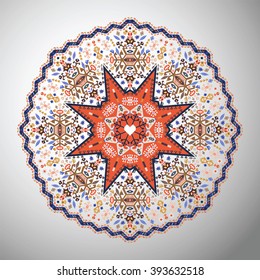 Ornamental round colorful geometric pattern in aztec style