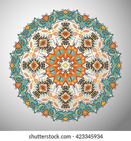 Ornamental round colorful geometric pattern in aztec style