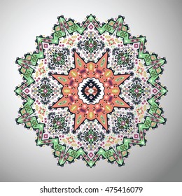 Ornamental round colorful geometric pattern in aztec style