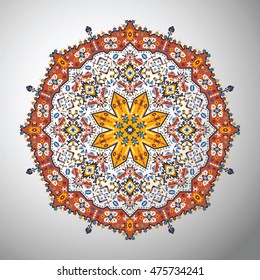Ornamental round colorful geometric pattern in aztec style