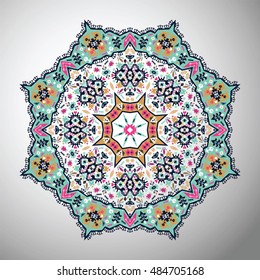 Ornamental round colorful geometric pattern in aztec style
