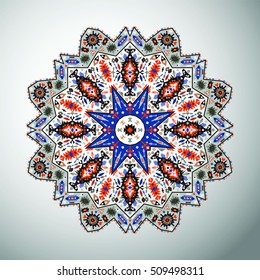 Ornamental round colorful geometric pattern in aztec style