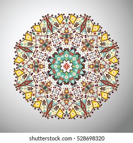 Ornamental round colorful geometric pattern in aztec style