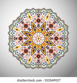 Ornamental round colorful geometric pattern in aztec style