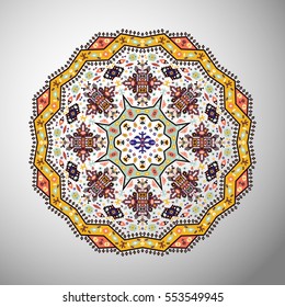 Ornamental round colorful geometric pattern in aztec style