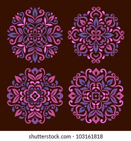 Ornamental round floral pattern. Set of four colorful ornament