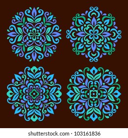 Ornamental round floral pattern. Set of four colorful ornament