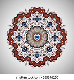Ornamental round geometric pattern in aztec style