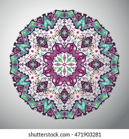 Ornamental round geometric pattern in aztec style