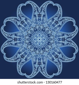 Ornamental round lace on blue background.