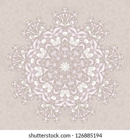 Ornamental round lace pattern, circle beige background.