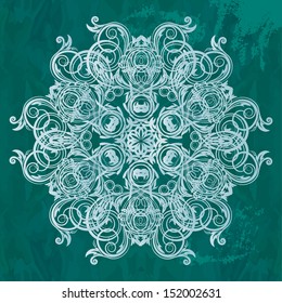 ornamental round lace pattern on grunge background
