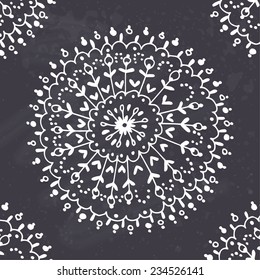 Ornamental round lace pattern on chalkboard background. Vector illustration. 
