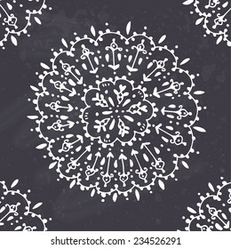 Ornamental round lace pattern on chalkboard background. Vector illustration. 